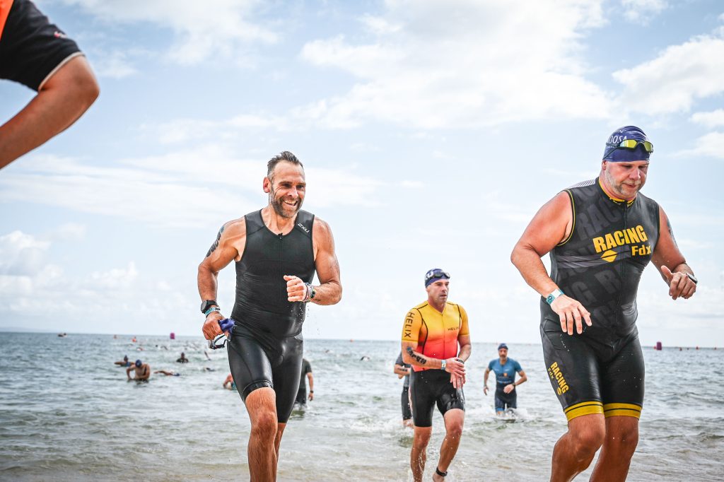 Dominic Byrne coming out of the water, Noosa Tri