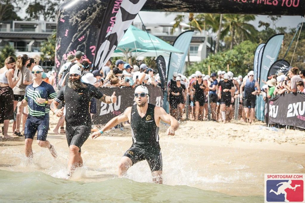 Tristan entering the water at the start of the Noosa Tri